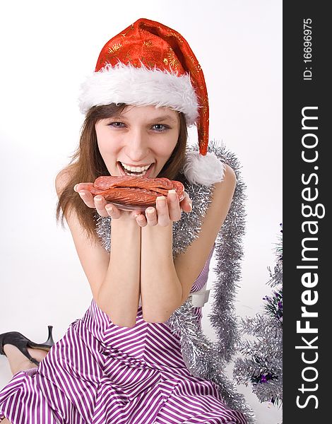 Girl holds a sausage