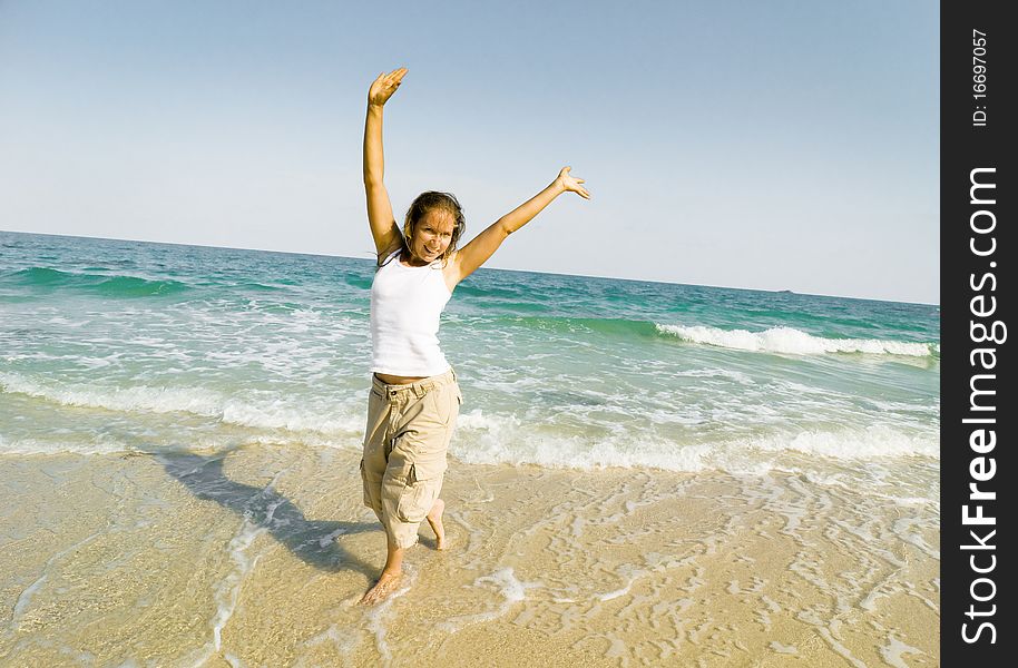 Woman running at the beach. Woman running at the beach