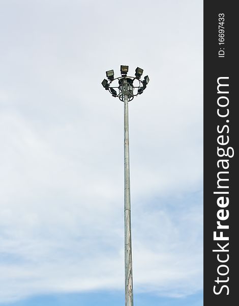 Steel sport light tower in sky background