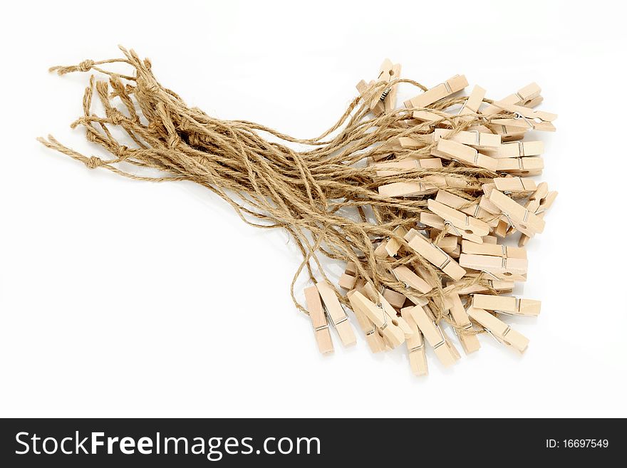 Wooded clothespins isolated on white background