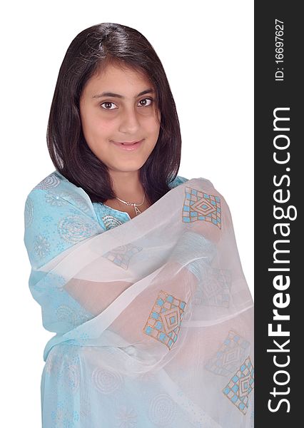 A sweet indian girl wraping her dupatta around her body and looking at the camera sweetly. A sweet indian girl wraping her dupatta around her body and looking at the camera sweetly.