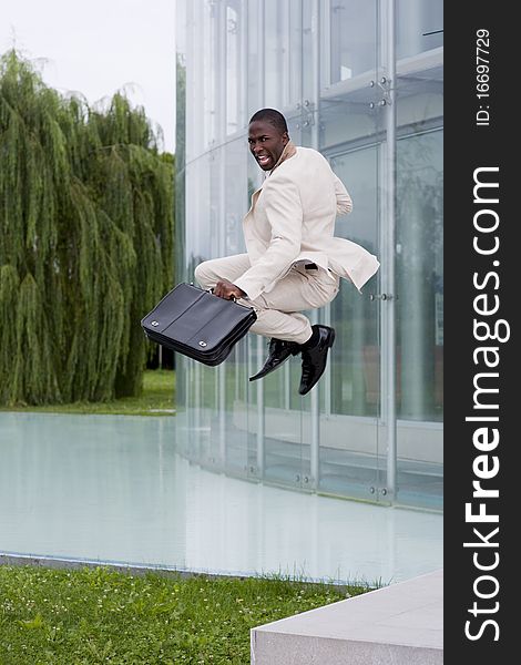 Businessman Jumping Of Happiness