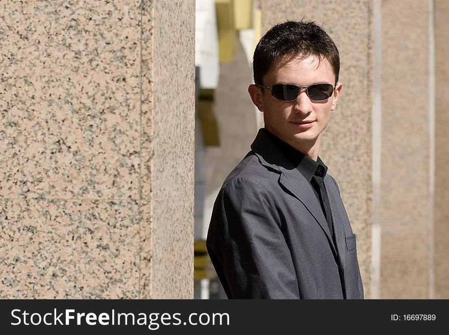 Young businessman in sunglasses