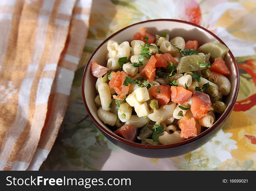 Macaroni salad with red  fish