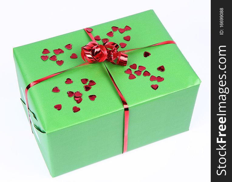 Gift with heart shaped confetti