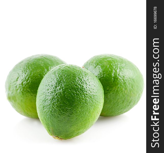 Three limes isolated on white background