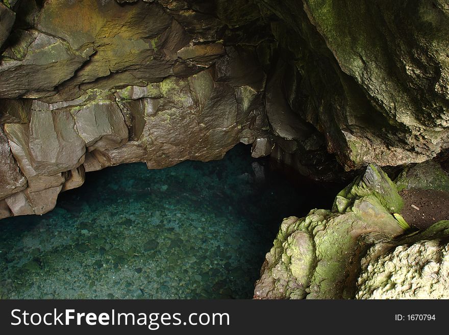 Water pool in a cave at Waianapanapa State Park. Water pool in a cave at Waianapanapa State Park