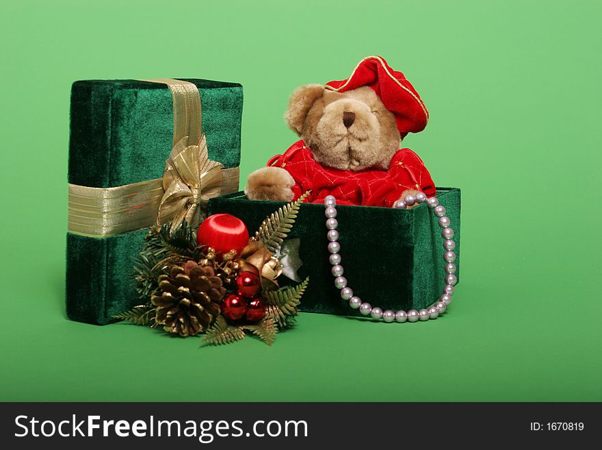 Christmas presents, teddy bear and pearls