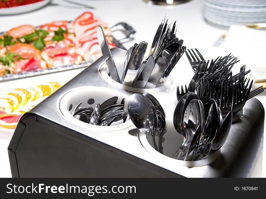 Table setting with forks, knives and spoons. Table setting with forks, knives and spoons
