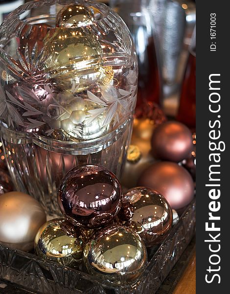 Arrangement of christmas ornaments in crystal tray with crystal jar. Arrangement of christmas ornaments in crystal tray with crystal jar