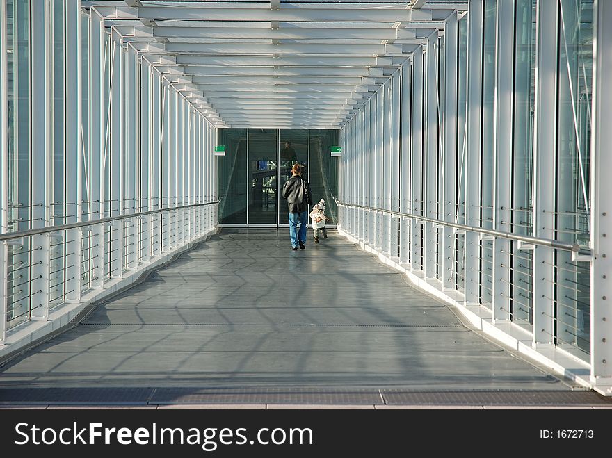 Father and son in corridor, Munich airport, Germany
