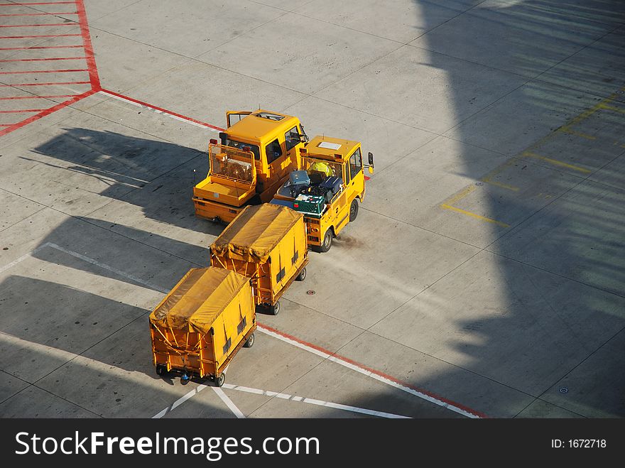 Luggage carts on apron, Munich airport, Germany