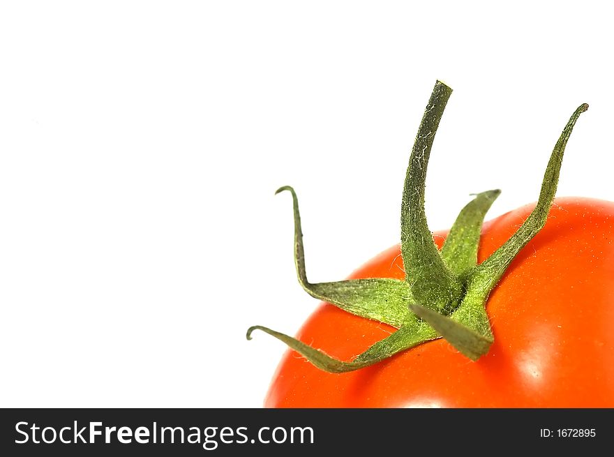 Tomato isolated on white background, lower right corner