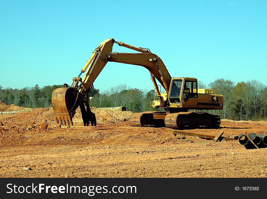 Photographed backhoe at construction site in Georgia.