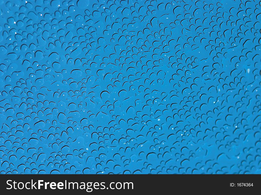 Raindrops on glass - specular highlights left for effect. Raindrops on glass - specular highlights left for effect