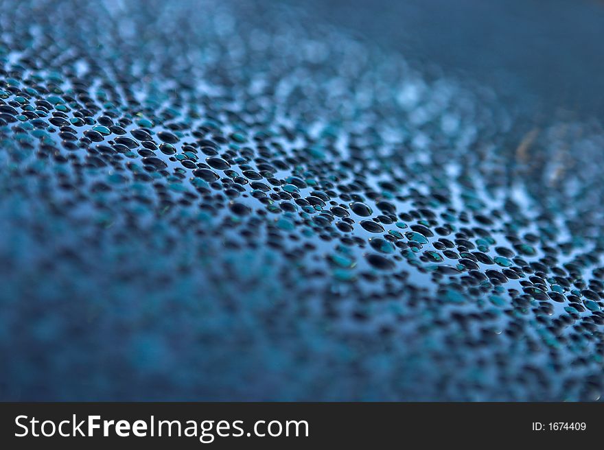 Water droplets on glass - shallow depth of field. Water droplets on glass - shallow depth of field