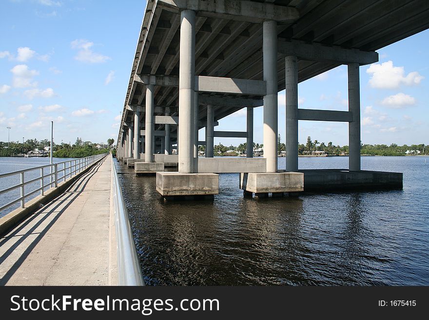 Tall Bridge And Long Fishing Pier