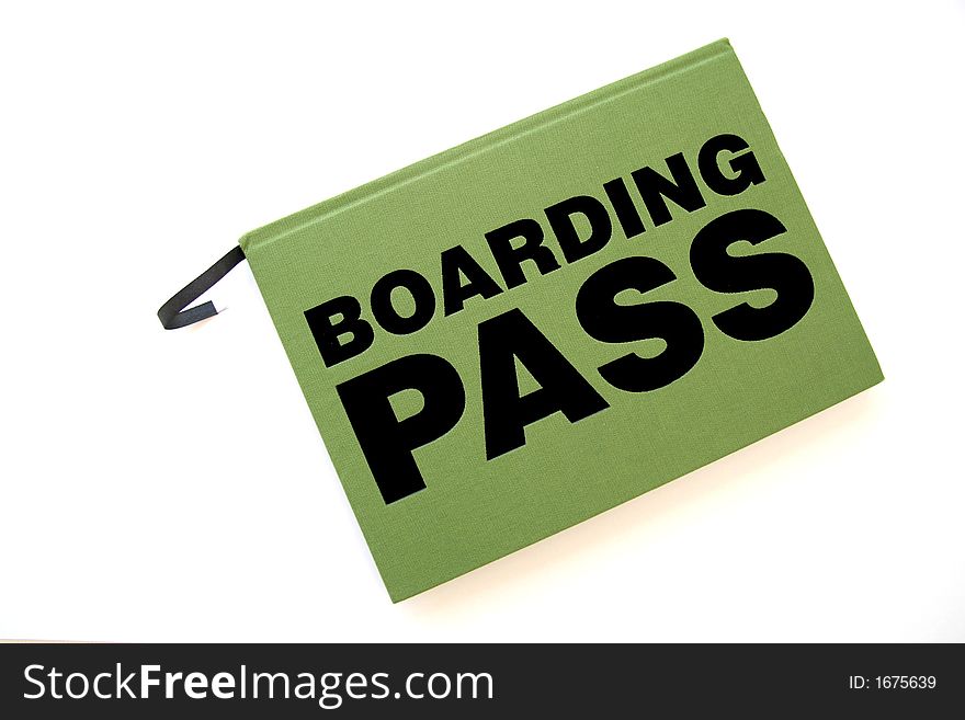 Green book with black boarding pass inscription. Green book with black boarding pass inscription