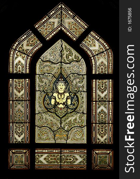 Traditional Thai style stained glass window in wat Chakrawat, Bangkok, Thailand. Traditional Thai style stained glass window in wat Chakrawat, Bangkok, Thailand