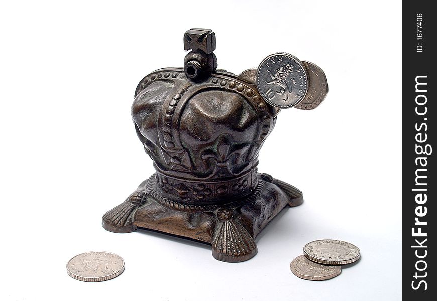 Brass money box with coins