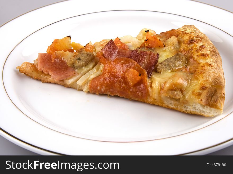 Close up of a pizza on a plate.