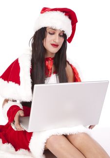 Mrs Santa Dark Hair Laptop Serious Royalty Free Stock Images