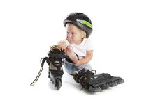 Toddler With Rollerskates Over White Stock Photo
