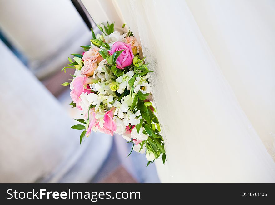 Bride holding her bridal bouquet. Close up. Bride holding her bridal bouquet. Close up