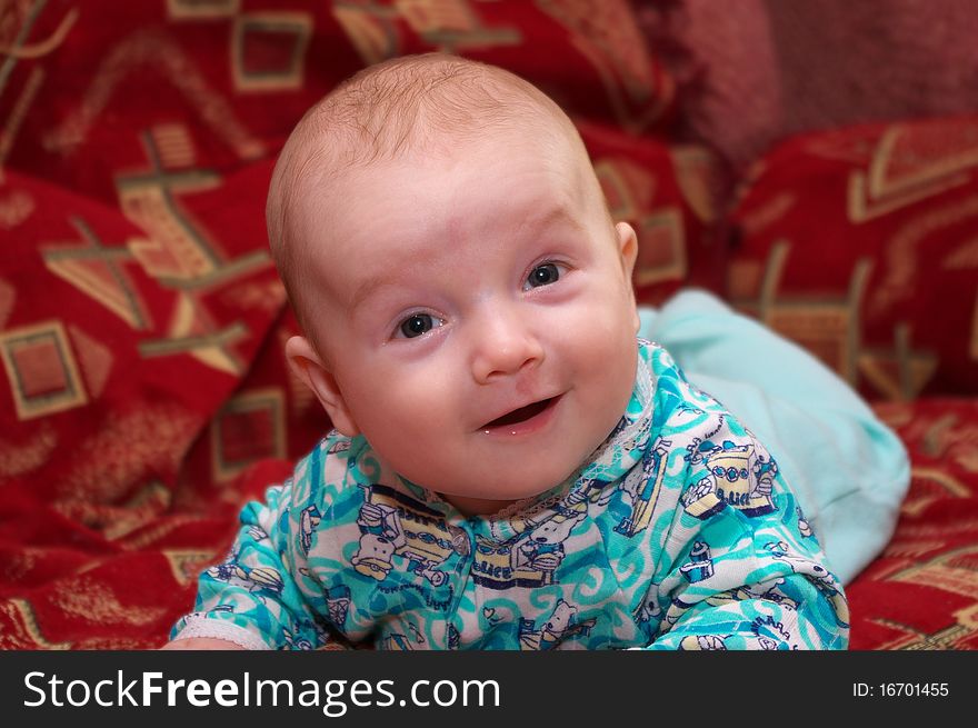 Photo of the beautiful baby with smile on face. Photo of the beautiful baby with smile on face