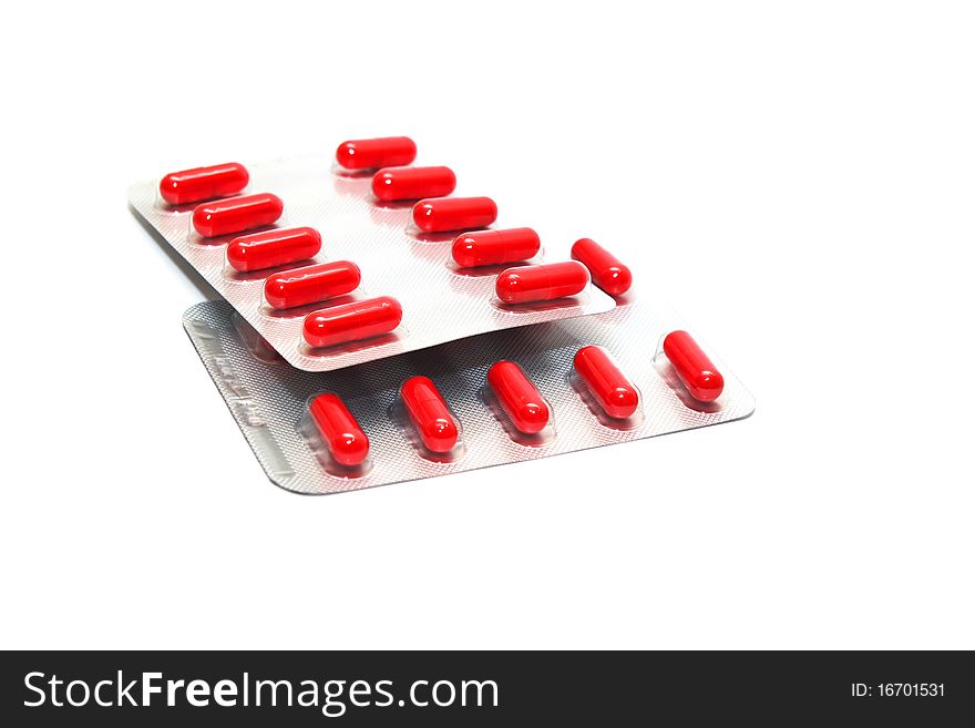 Photo of the packings of pills on white background