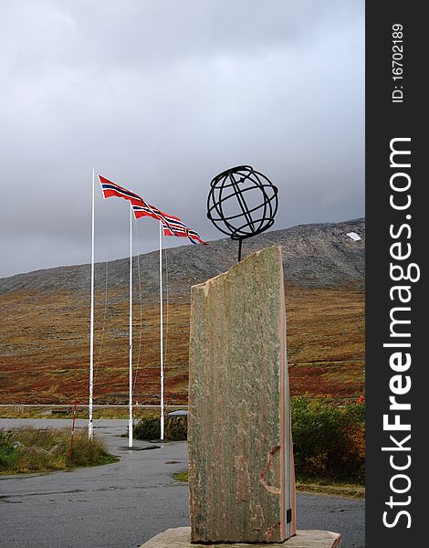 Norwegian flag on the Arctic Circle