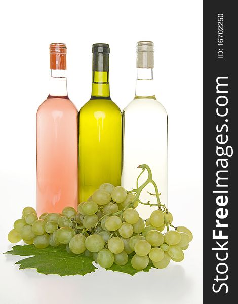 Wine and grapes, on white background. Wine and grapes, on white background.
