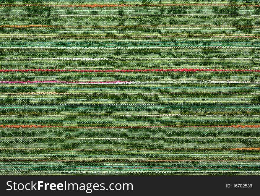 Striped fabric background of different colors