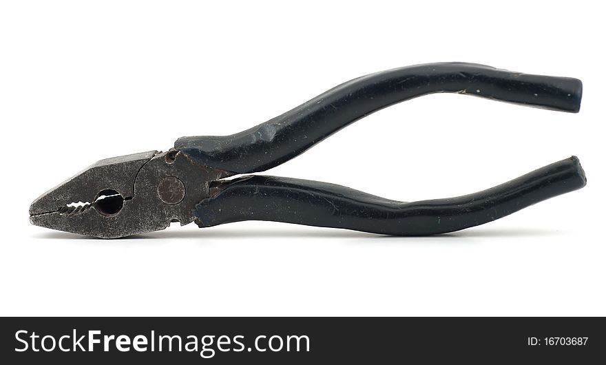 Studio shot of black old pliers isolated on white .Focus on metal