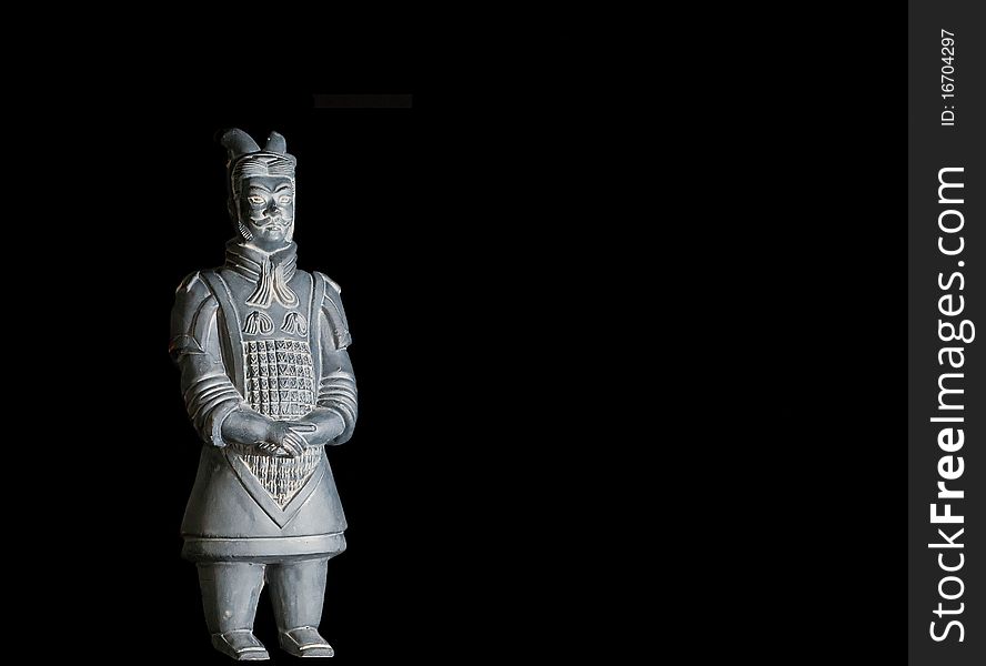A replica of an unearthed terracotta warrior from china. A replica of an unearthed terracotta warrior from china