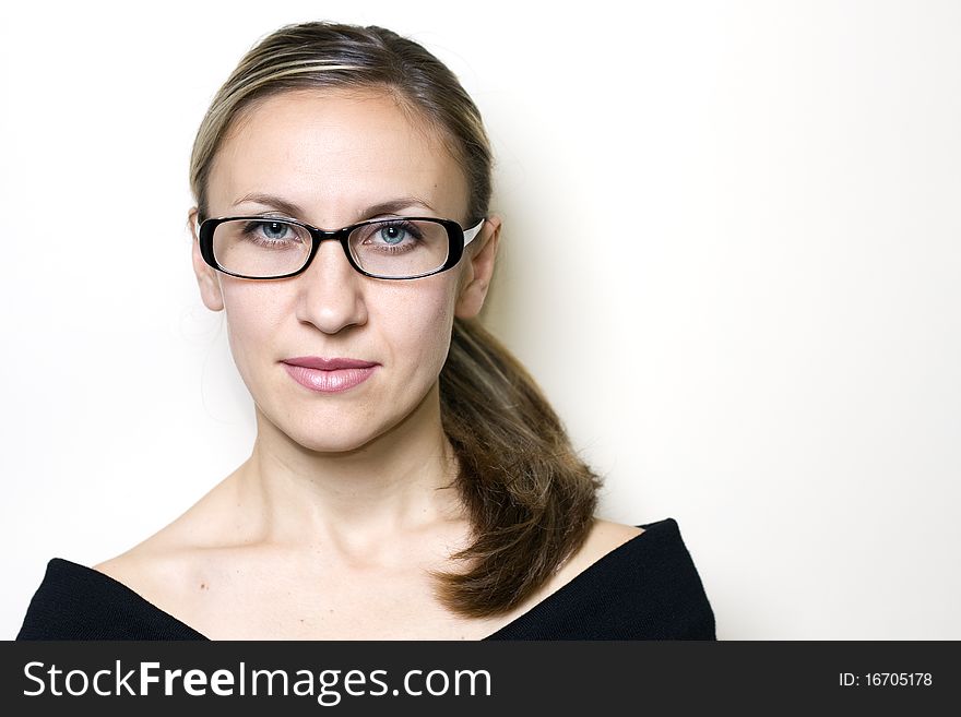 Beautiful young woman wearing glasses. Beautiful young woman wearing glasses