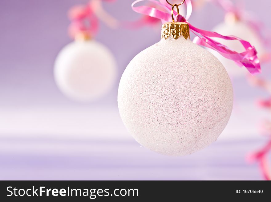 Holiday series:  Christmas decorated white ball withy ribbon. Holiday series:  Christmas decorated white ball withy ribbon