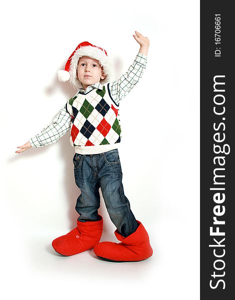 Happy small boy with santa-hat, smiling