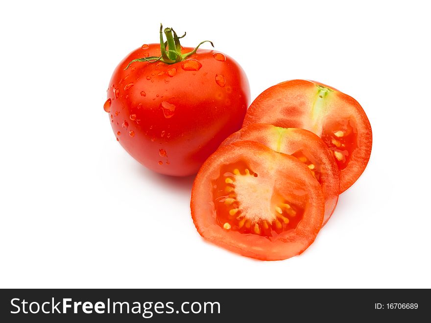 Tomatoes (whole and slised) isolated on white