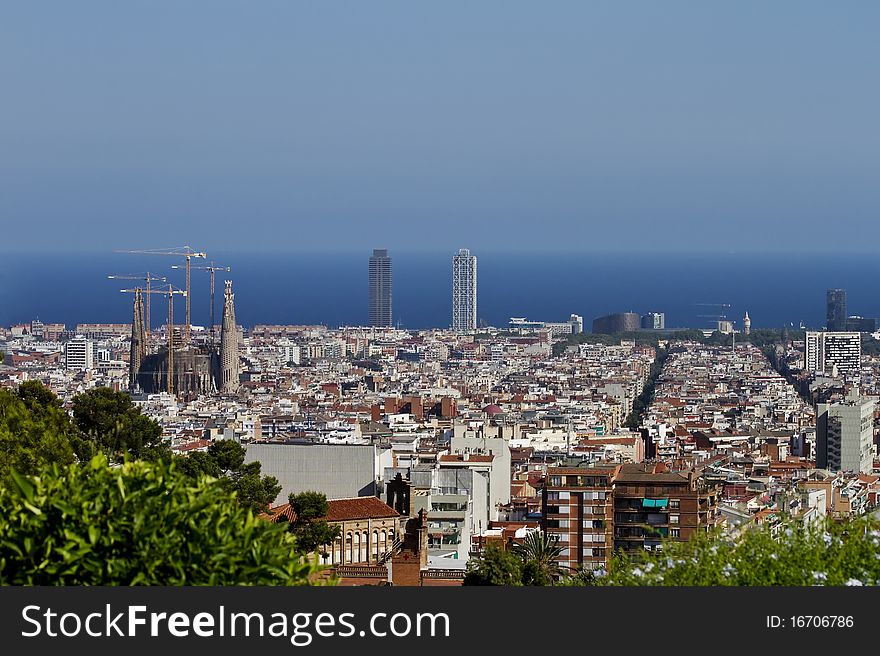 View of the City of Barcelona from a nearby hill. You can view the Sagrada Familia church at left. View of the City of Barcelona from a nearby hill. You can view the Sagrada Familia church at left.