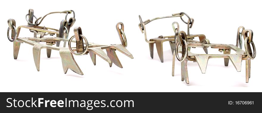 Two Steel Crampon isolated on the white background