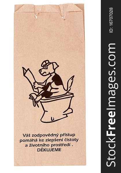 Paper package for collection of the excrement of the dogs on white background