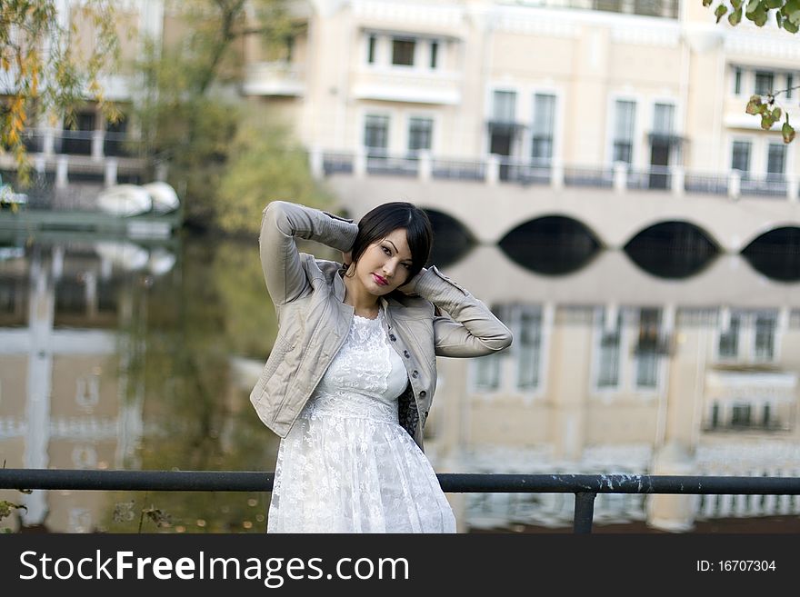 Girl walking near river