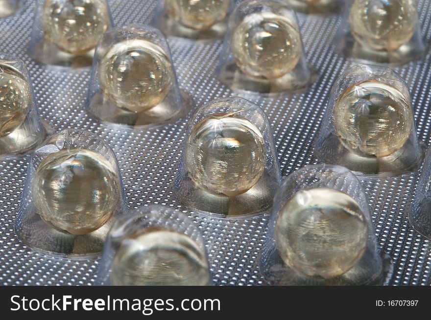 Gel pills in the package, close-up, selective focus