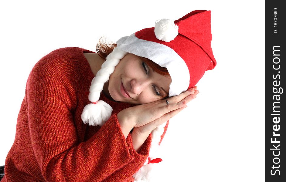 Woman in santa's cap isolated on white background