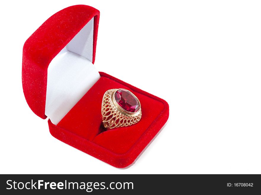 Gift box and ring with red gem inside isolated over white