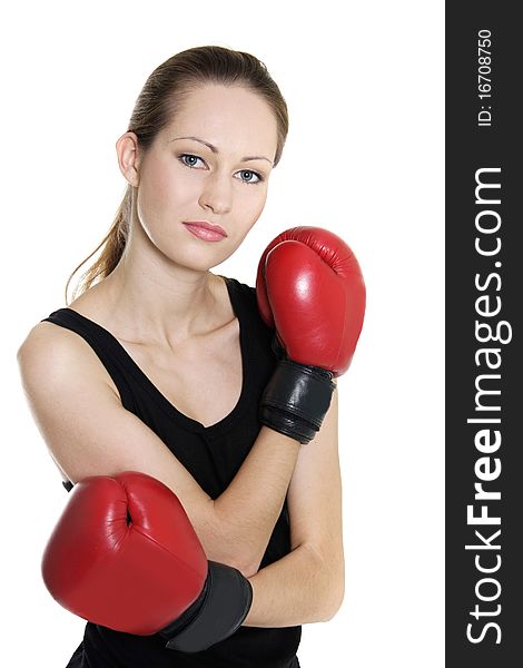 Young female boxer over white