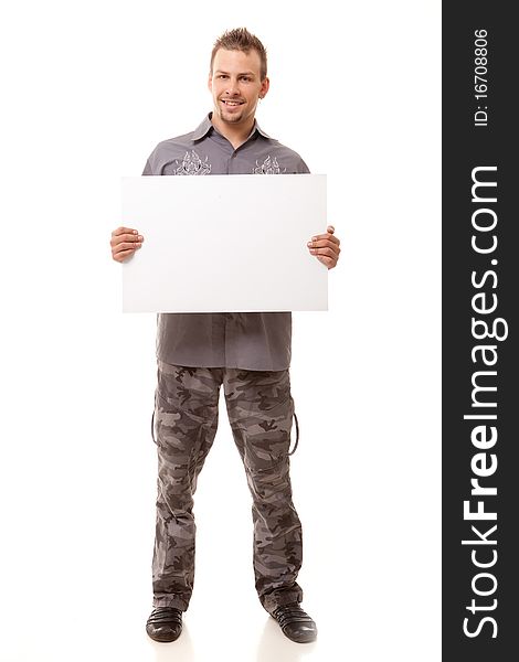 Smiling young handsome man with white clear board on white background. Smiling young handsome man with white clear board on white background