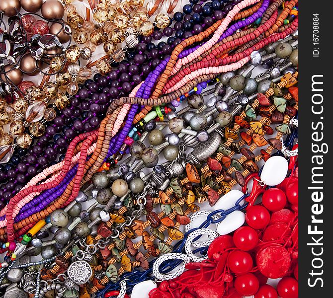 Bijouterie multicolored background made from many necklaces. Bijouterie multicolored background made from many necklaces