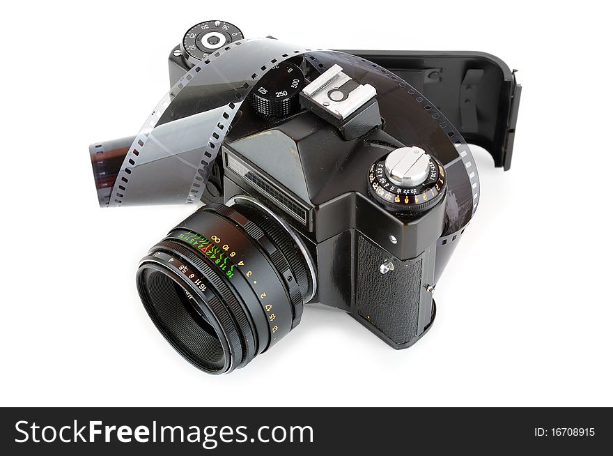 Opened classic manual SLR film camera with film